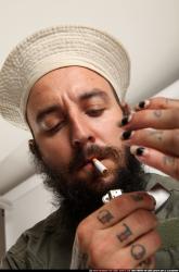 edgar-lighting-up-cigarette