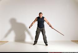 Man Adult Athletic White Fighting with sword Moving poses Sportswear