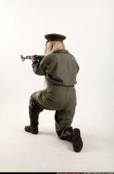 Woman Young Average Fighting with submachine gun Kneeling poses Army Asian