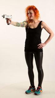 zora-standing-aiming-uzi