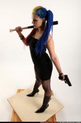 dolores-bat-pistol-pose