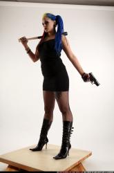 dolores-bat-pistol-pose