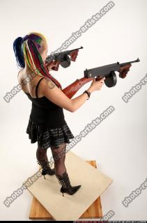 2016 05 DOLORES DUAL TOMMYGUNS POSE2 05 A