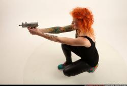 Woman Adult Athletic White Fighting with submachine gun Kneeling poses Casual