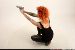 zora-kneeling-aiming-uzi