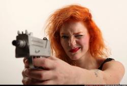 Woman Adult Athletic White Fighting with submachine gun Kneeling poses Casual