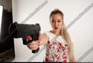 kayaa-pistol-pose3