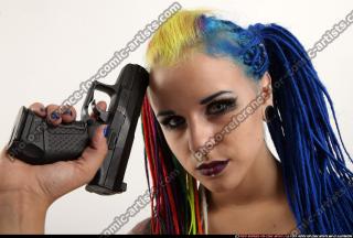 2016 07 DOLORES SITTING PISTOL KNIFE POSE 09