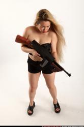 kaya-standing-tommygun