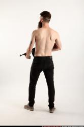 oscar-standing-tommygun-guarding