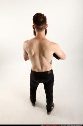 oscar-standing-tommygun-guarding