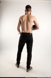 oscar-standing-tommygun-guarding