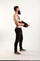 oscar-standing-tommygun-guarding