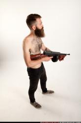 oscar-standing-tommygun-guarding