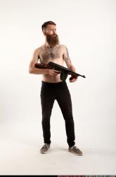 oscar-standing-tommygun-guarding