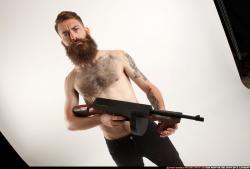 oscar-standing-tommygun-guarding