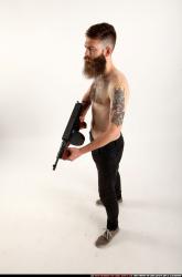 oscar-standing-tommygun-guarding