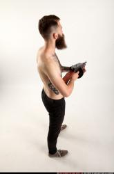 oscar-standing-tommygun-guarding