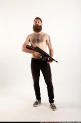 oscar-standing-tommygun-guarding