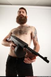 oscar-standing-tommygun-guarding