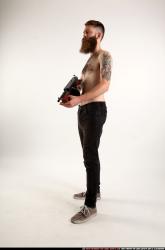 oscar-standing-tommygun-guarding