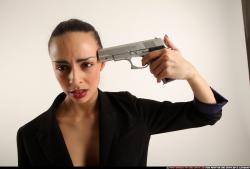 Woman Young Athletic White Fighting with gun Standing poses Business