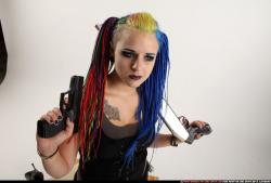 dolores-kneeling-pistol-shotgun