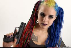 dolores-kneeling-pistol-shotgun