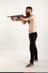 oscar-standing-tommygun-shooting