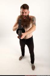 oscar-standing-tommygun-shooting