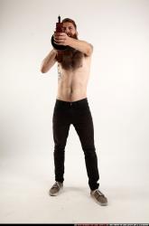 oscar-standing-tommygun-shooting