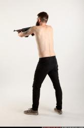 oscar-standing-tommygun-shooting