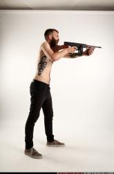 oscar-standing-tommygun-shooting