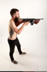 oscar-standing-tommygun-shooting