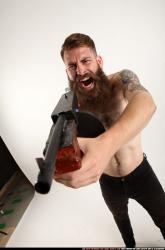 oscar-standing-tommygun-shooting