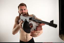 oscar-standing-tommygun-shooting