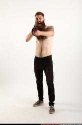 oscar-standing-tommygun-shooting