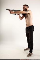 oscar-standing-tommygun-shooting