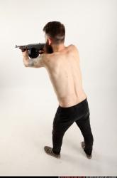 oscar-standing-tommygun-shooting