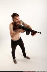 oscar-standing-tommygun-shooting