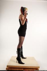 dolores-standing-pistol-shotgun