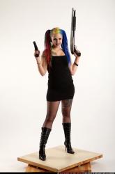 dolores-standing-pistol-shotgun