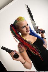 dolores-standing-pistol-shotgun