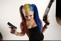 dolores-standing-pistol-shotgun