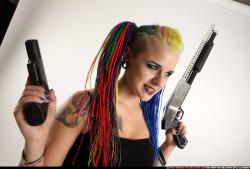 dolores-standing-pistol-shotgun