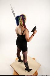 dolores-standing-pistol-shotgun