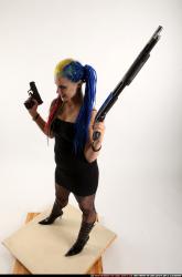 dolores-standing-pistol-shotgun