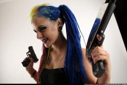 dolores-standing-pistol-shotgun