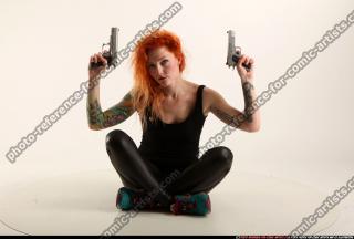 2016 11 ZORA DUAL PISTOLS POSE4 00 B