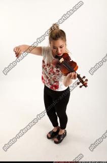 kaya-standing-playing-violin